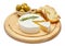 Round brie or camambert cheese on cutting board white background