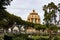 Round building of Church of Saint Thomas al Pantheon Chiesa di San Tommaso in Siracusa behind the trees