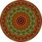 Round carpet with sun-shaped mandala in terracotta and emerald colors. Interior Design