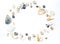 Round circle of small marine colorful light orange blue pink purple seashells of different shapes on white background. Snail shell