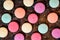 round colorful cookies or biscuits on a rusty background, topview