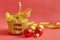 Round cookies with cereals and seeds tied with a gold ribbon, Christmas toys