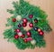 Round crown Christmas pine tree with globe ornaments close up