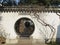 The round door and white wall of the Suzhou garden.