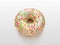 Round doughnut with vanilla icing with colored splashes