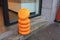 Round Dutch cheese shapes stacked in a row outside a Dutch shop