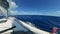 Round first-person view from a sailing vessel with ladies on it