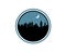 Round flat style emblem logo of midnight city skyline with crescent moon