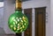 Round green lamp with frosted glass and yellow pattern