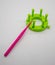 Round knitting loom kit. Pink knitting needle and bright green c