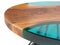 Round live edge wooden coffee table with epoxy resin on a white background. 3D rendering