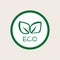 Round logo. The outline of the green leaves. Text ECO.