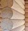 Round logs in the wall of a wooden house stacked on top of each other. Ecological house. Building