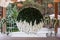 Round made of flowers and leaves european style wedding photozone decorated with flowers