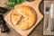 Round meat pie. Traditional dish of the cuisine of the Caucasus