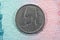 round metal ten Egyptian milliemes series 1941 AD 1360 AH features bust of King Farouk I of Egypt on obverse side and value and