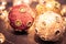 Round ornaments covered in rich jewels and glitter, baubles and soft lights for Christmas holiday, split tone