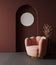 round painting mockup in stylish living room interior, modern pink armchair and decorative arch with trendy dried flowers on dark