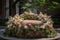 a round podium covered in springtime blooms and greenery