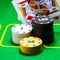 Round poker chips bright and colorful behind which falls a playing card diamond king