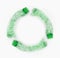 Round recycling icon from empty green plastic bottles on white background. Waste recycling concept. Garbage. Isolation on white.