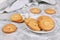 Round ring shaped spritz biscuits, a type of German butter cookies