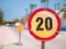 A round road sign in Spain. 20 kilometers are allowed at one construction site.