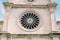 Round rose window close-up in the triple-nave basilica of St. James in Sibenik, Croatia