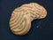 Round shape Indian biscuits on black background