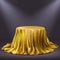 Round show table stage covered with golden cloth