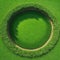 Round slice of grass field with soil piece of land with green grass surface isolated with Fresh environment and tourism