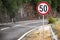 Round speed limit road sign