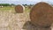 Round stack of straw or hay on the field