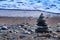 Round stacked stones on the shore