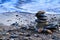 Round stacked stones on the shore