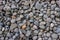 Round stone photo for background. Big pebble stone industrial texture. Gravel closeup. Road or building construction