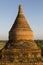Round, stone stupa of a pagoda in the golden evening light