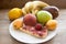 Round strawberry pie with fresh strawberries slice on plate dish on wooden table background