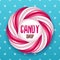 Round swirl candy cane and polka dot background. Hard candy frame.