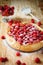 Round tart with fresh raspberries