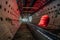 Round tiled tunnel in abandoned underground nuclear physics laboratory