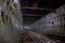 Round tiled tunnel in abandoned underground nuclear physics laboratory