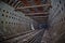 Round tiled tunnel in abandoned underground nuclear physics laboratory