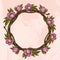 Round vintage frame made of branches with lush flowers. Decorative element for design work in the boho style