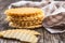 Round waffle biscuits on wooden table