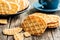 Round waffle biscuits on wooden table