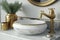 round white wash basin with brass faucet and accessories