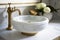 a round white wash basin with vintage brass faucet, creating a historical and minimalist look