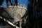 A round window from Iulia Hasdeu palace photographed from the tree