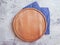 Round wooden board kitchenware traditional on concrete background design